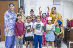 Children cheering at the end of a kids’ class
